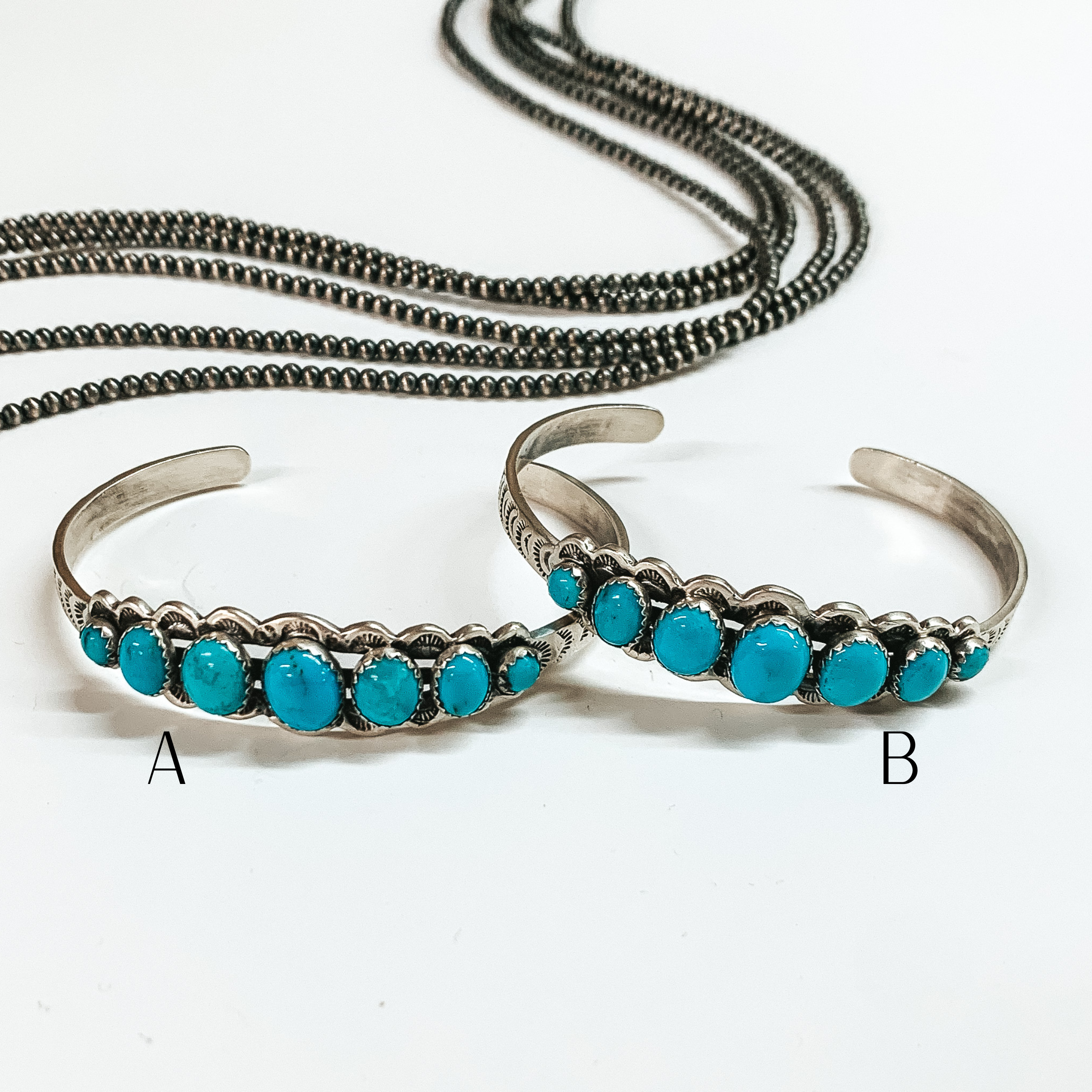 Premium Navajo Handmade Sterling Silver Cuff Bracelet with Seven Turquoise Stones by Russell Sam